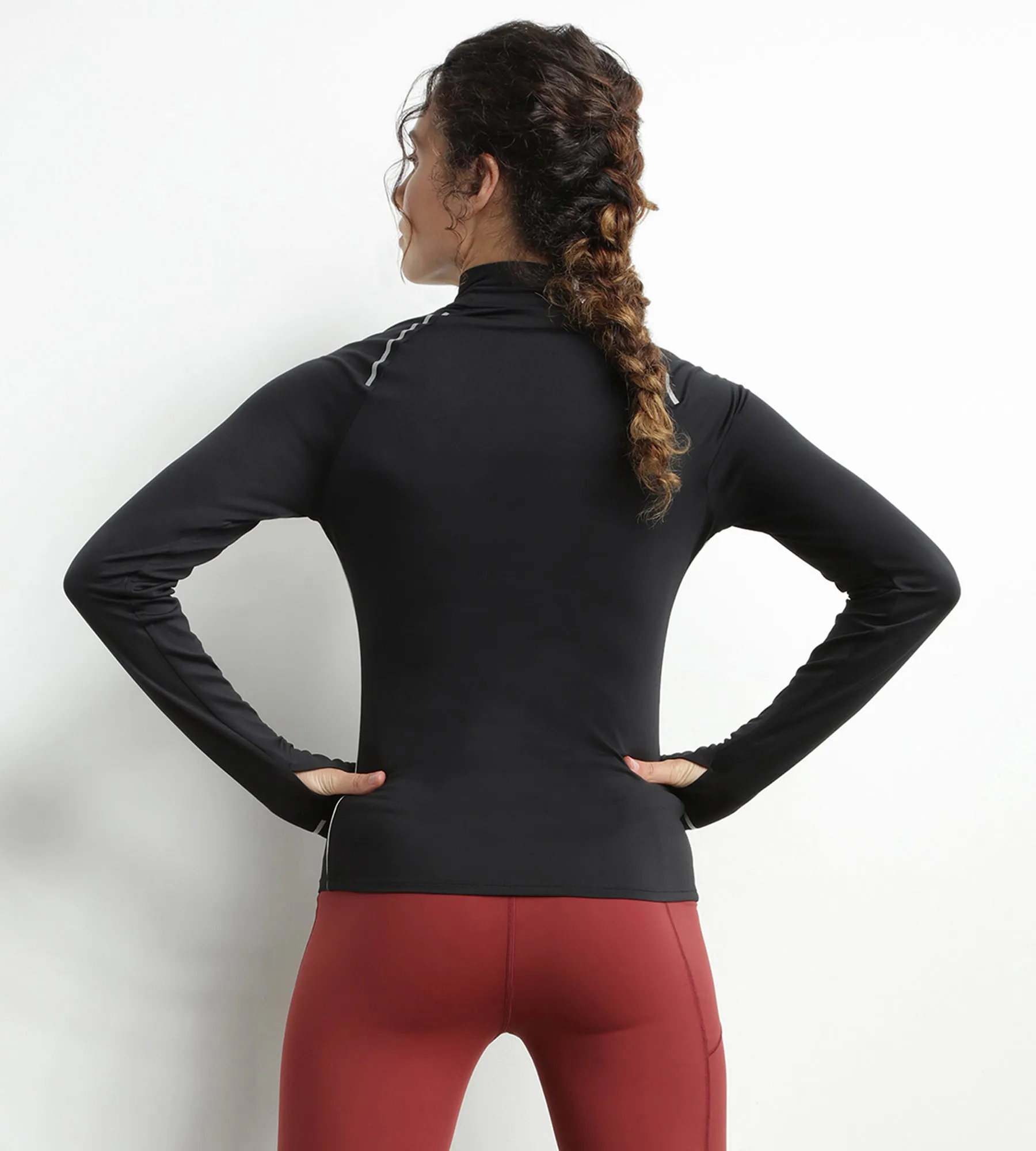 Women's sports top with high collar in black microfiber Dim Move